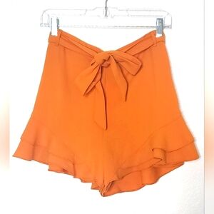 River Island Orange Colored Shorts.  Size US 8. UK 12.